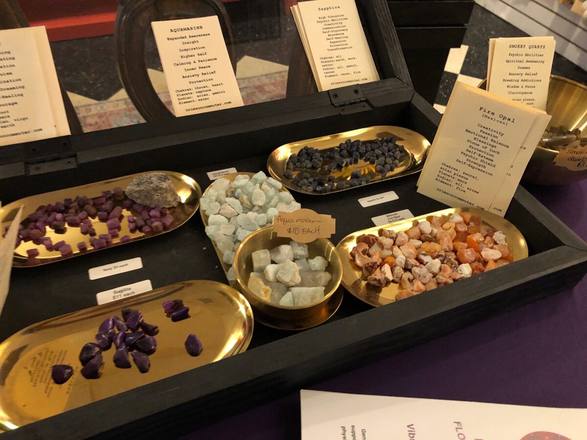 Crystal elixir bottles and a charging station at a Prismatic workshop